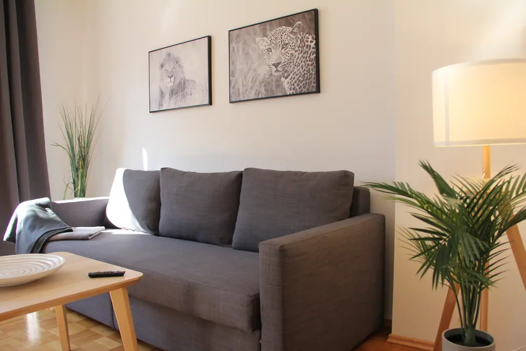 Africa Lodge: Sofa mit Leopardenbild